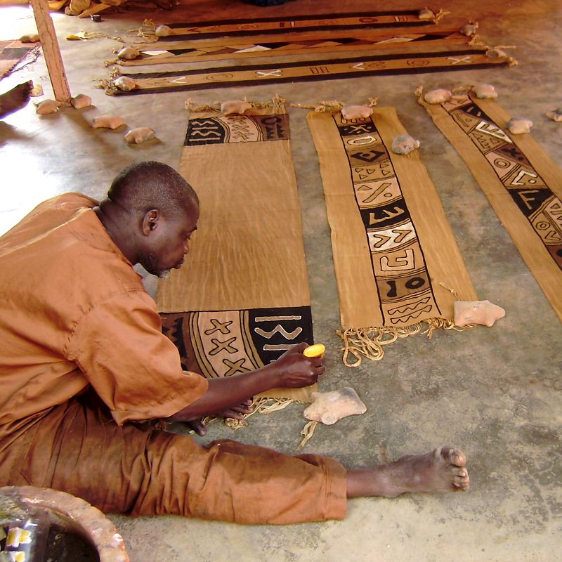 Painting mud cloth Segou Mali