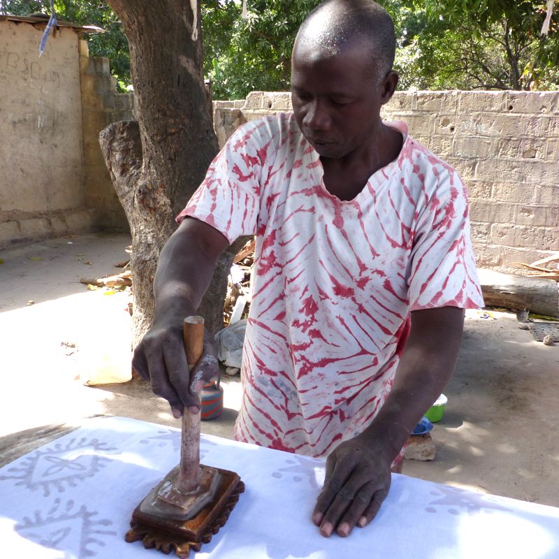 Musa Jaiteh wax stamping in The Gambia